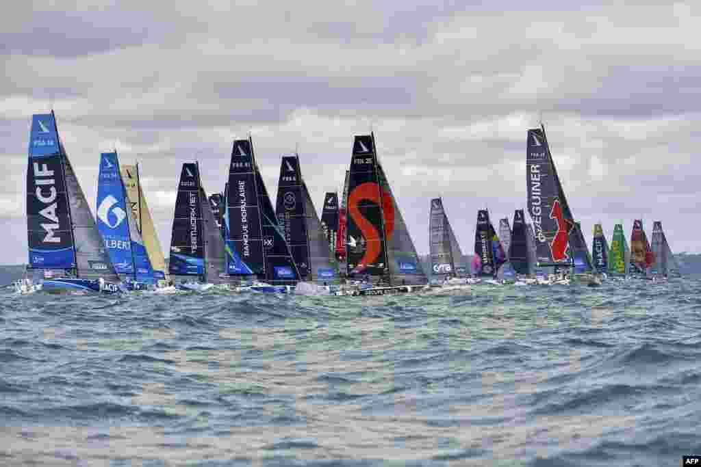 Sail boats take the start of the 51st edition of La Solitaire du Figaro solo sailing race off the coast of Saint-Quay-Portrieux, in Saint-Brieuc Bay, northwestern France, in the first stage of the race.