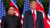 FILE - U.S. President Donald Trump, right, meets with North Korean leader Kim Jong Un on Sentosa Island, in Singapore, June. 12, 2018.