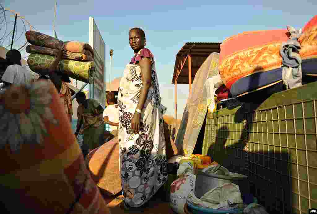 Residents of Juba seek shelter at a U.N. compound. African diplomats made a push for peace in South Sudan on Friday as bitter fighting spread across the world&#39;s youngest nation. 