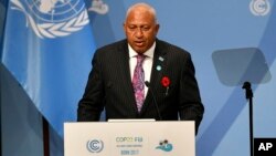 Fiji's Prime Minister Frank Bainimarama talks at the opening of the U.N. Climate Change Conference in Bonn, Germany, Nov. 6, 2017. 