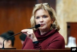 Rep. Becky Currie, R-Brookhaven, a registered nurse, explains a portion of House Bill 1510, which could make the state the first to ban most abortions after 15 weeks of pregnancy in House chambers at the Capitol in Jackson, Miss., Feb. 2, 2018.