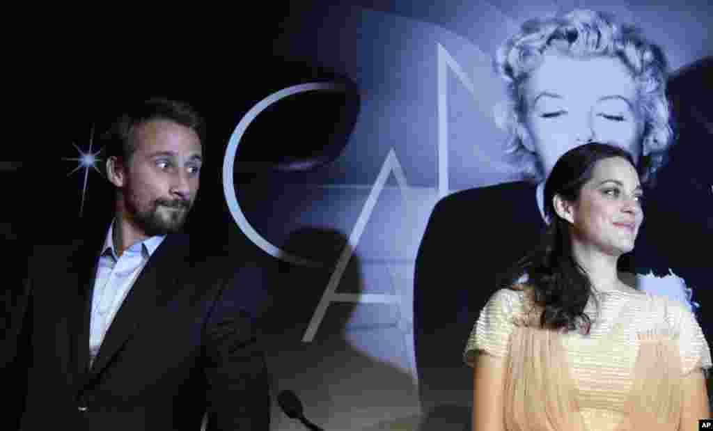 Actors Matthias Schoenaerts and Marion Cotillard arrive for a press conference for Rust and Bone at the 65th international film festival, in Cannes, France, May 17, 2012.