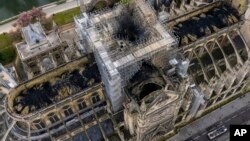 An image made available by Gigarama.ru on April 17, 2019 shows an aerial shot of the fire damage to Notre Dame cathedral in Paris, France. 