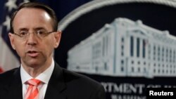 U.S. Deputy Attorney General Rod Rosenstein speaks at a news conference at the Justice Department in Washington, March 23, 2018.