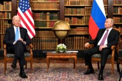FILE - U.S. President Joe Biden and Russia's President Vladimir Putin meet for the U.S.-Russia summit at Villa La Grange in Geneva, Switzerland, June 16, 2021.
