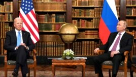 FILE - U.S. President Joe Biden and Russia's President Vladimir Putin meet for the U.S.-Russia summit at Villa La Grange in Geneva, Switzerland, June 16, 2021.
