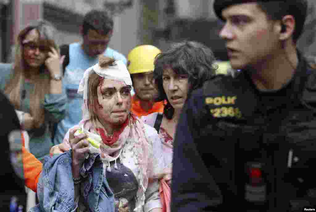 Injured people after an explosion in Prague, April 29, 2013.