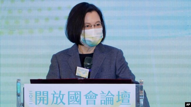 FILE - Taiwan's President Tsai Ing-wen delivers a speech during the opening of the 2021 Open Parliament Forum in Taipei, Taiwan, Dec. 2, 2021. Taiwan will be among the participants of a Summit for Democracy hosted by U.S. President Joe Biden.