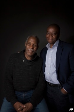 Filmmaker Yance Ford, right, and Danny Glover pose for a portrait to promote the film "Strong Island" at the Music Lodge during the Sundance Film Festival, Jan. 22, 2017, in Park City, Utah.