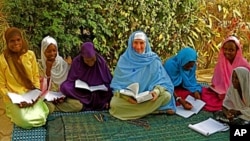 Maryam Kabeer Faye, here in 2009, teaching Arabic to students in Gambia