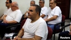 El Salvador's former president Antonio Saca waits for his hearing on corruption charges in Santa Salvador, El Salvador, May 16, 2018.
