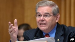 Senate Foreign Relations Committee member Sen. Robert Menendez, D-N.J., speaks on Capitol Hill in Washington, Thursday, Dec. 1, 2011, during the committee's hearing to examine US strategic objectives towards Iran.