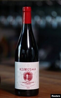 A bottle of Kumusha wine, a brand owned by Zimbabwean sommelier Tinashe Nyamudoka, is pictured in Johannesburg, South Africa, June 25, 2021. Picture taken June 25, 2021. REUTERS/Siphiwe Sibeko