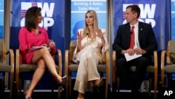Ivanka Trump, center, daughter of President Donald Trump, speaks at a roundtable discussion to announce the first batch of grants that are part of a White House initiative to help women in developing countries advance economically, Wednesday, July 10, 2019, in Washington. 