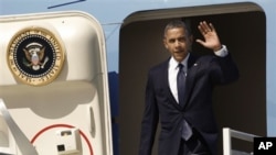 President Barack Obama leaving Air Force One