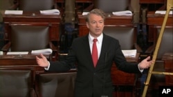 In this image from video from Senate Television, Sen. Rand Paul, R-Ky., speaks on the floor of the Senate on Capitol Hill in Washington, Feb. 8, 2018.