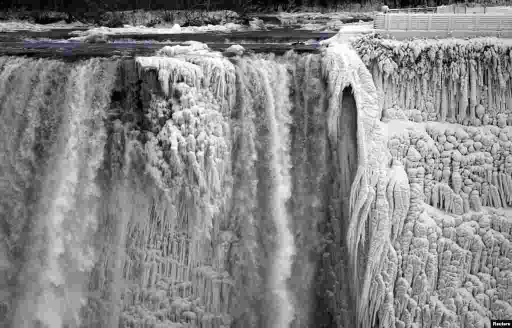 The U.S. side of the Niagara Falls is pictured in Ontario, Jan. 8, 2014. The frigid air and &quot;polar vortex&quot; that affected about 240 million people in the United States and southern Canada will depart during the second half of the week, and a far-reaching January thaw will begin, according to AccuWeather.com.