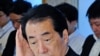 Japanese Prime Minister Clings to Office