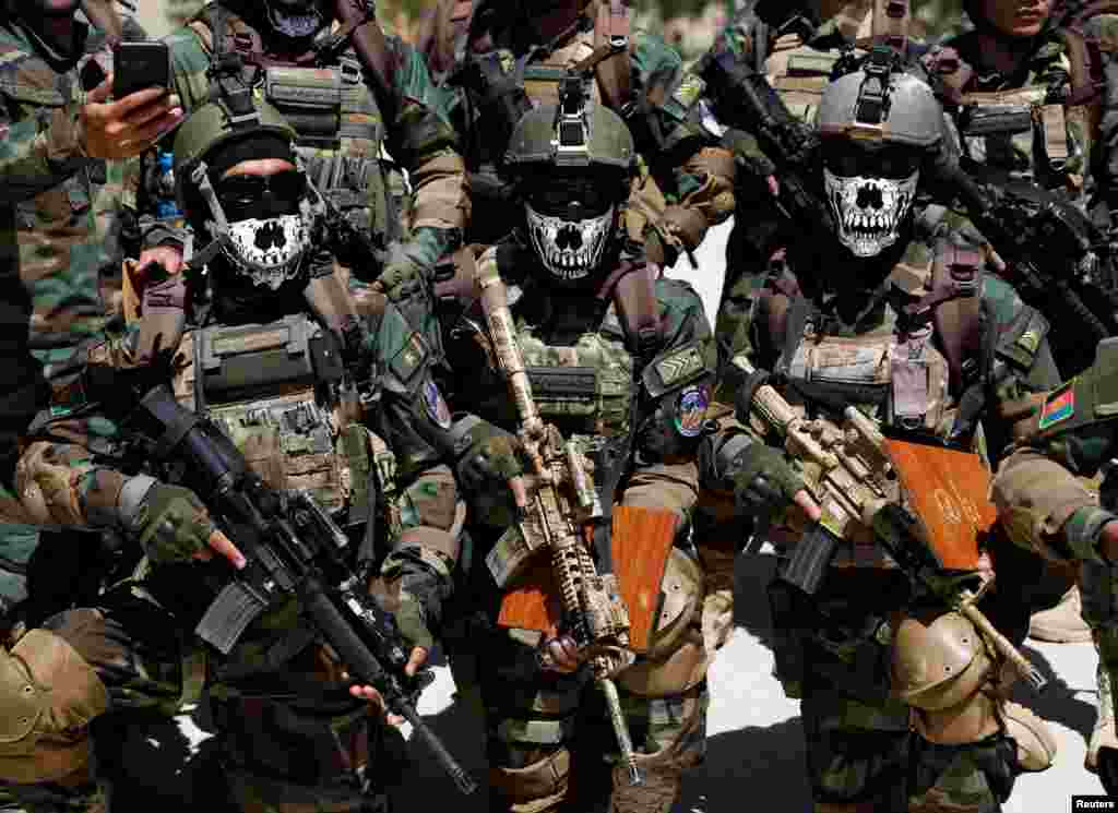 Afghan Special Forces attend their graduation ceremony in Kabul.