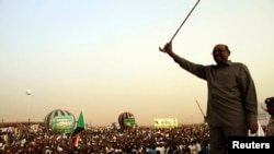 President Omar Hassan al-Bashir addresses crowd, North Khartoum, June 8, 2013.
