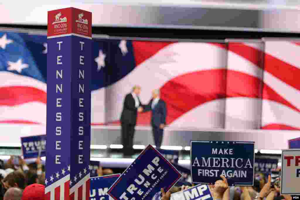 Republican Presidential nominee Donald Trump with his Vice Presidential nominee, Indiana Governor Mike Pence on stage at the Republican National Convention in Cleveland, Ohio, July 20, 2016. (Photo: Ali Shaker / VOA ) 