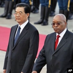 South African President Jacob Zuma, right, walks with Chinese President Hu Jintao. China has helped promote skills transfer in Africa