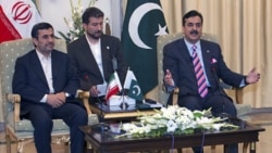 Pakistan's Prime Minister Yousuf Raza Gilani, right, with Iranian President Mahmoud Ahmadinejad at the prime minister's house in Islamabad