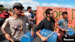 Demonstrators rally against public spending for the 2014 World Cup, in Brasilia.