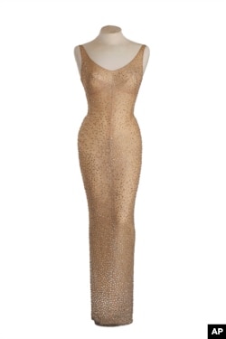 Marilyn Monroe had to be sewn into the form-fitting gown. (Julien's Auctions via AP)