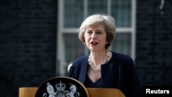 Britain's Prime Minister, Theresa May, has said Britain may begin the process of spliting with the E.U. next year..