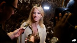 FILE - Kellyanne Conway, a top aide for President-elect Donald Trump, talks with reporters as she arrives at Trump Tower, Nov. 14, 2016, in New York City. On claims of Russian meddling in the U.S. election Conway asked "where is the evidence?"