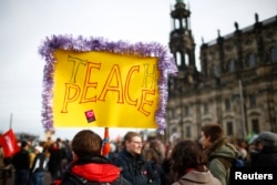 Opponents of the anti-Islam movement Pegida gather during demonstrations in Dresden, Germany, Feb. 6, 2016.