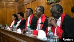 Kenya's Supreme Court judges preside before delivering a detailed ruling laying out their reasons for annulling last month's presidential election in Kenya's Supreme Court in Nairobi, Sept. 20, 2017.