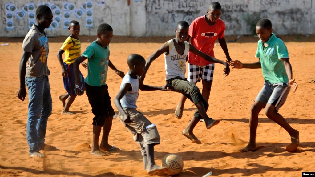 Image result for soccer with african children