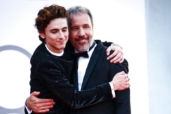 Aktor Timothee Chalamet dan sutradara Denis Villeneuve di acara pemutaran perdana film "Dune" di festival film Venice di Italia (dok: Joel C Ryan/Invision/AP)