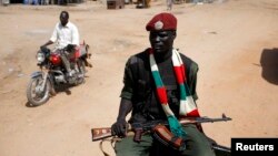 An SPLA soldier on patrol in Juba. South Sudan Interior Minister Aleu Ayienyi Aleu has ordered the security forces to shoot-to-kill anyone who violates the curfew in the capital.