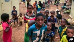 FILE - Children displaced by attacks gather in a makeshift camp for the displaced in Youba in Yatenga province in Burkina Faso. Taken 4.20.2020