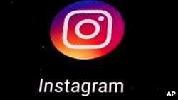 FILE - Instagram app logo is displayed on a mobile screen in Los Angeles. 