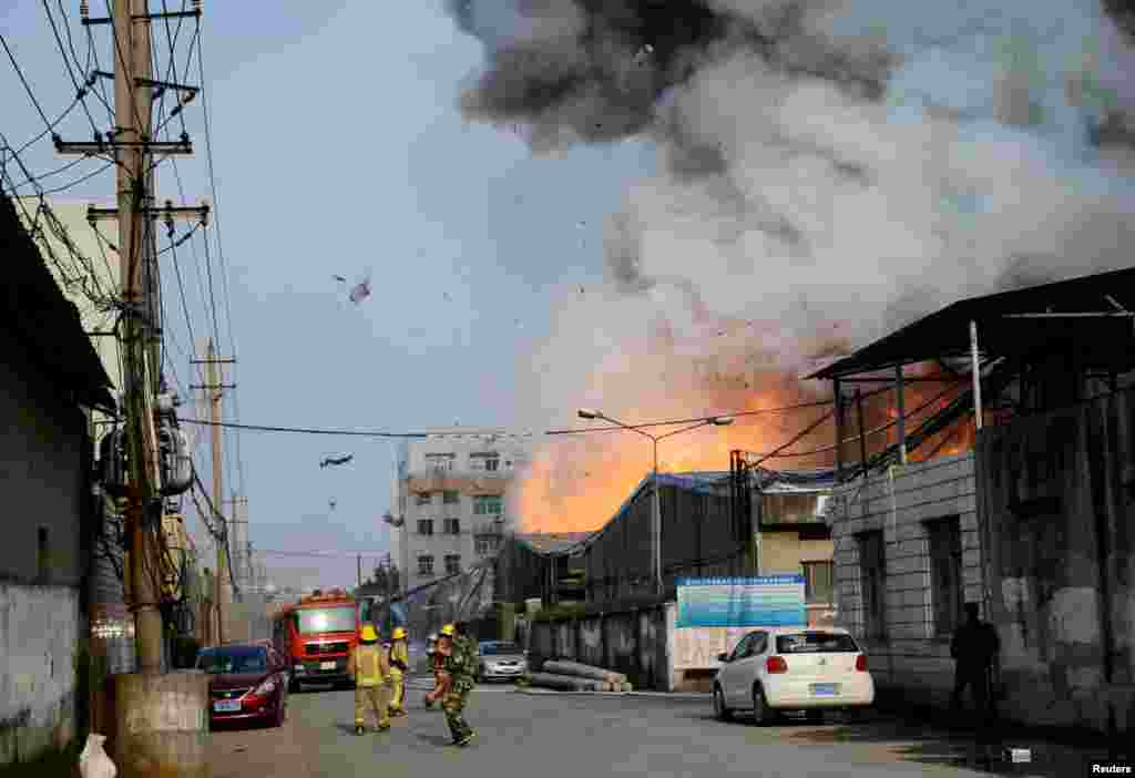 Smoke rises from an explosion at a chemical market in Wenzhou, Zhejiang province, China.