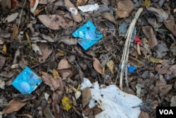 Condom wrappers scattered across a secluded spot in Pedion tou Areos park. The young men and boys will often have sex with the clients within the park’s confines. (Photo: J. Owens for VOA)