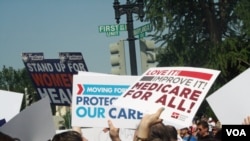 Demonstrators for and against the Affordable Health Act protest in Washington