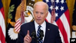 President Joe Biden speaks during a news conference in the East Room of the White House, Thursday, March 25, 2021, in Washington. 