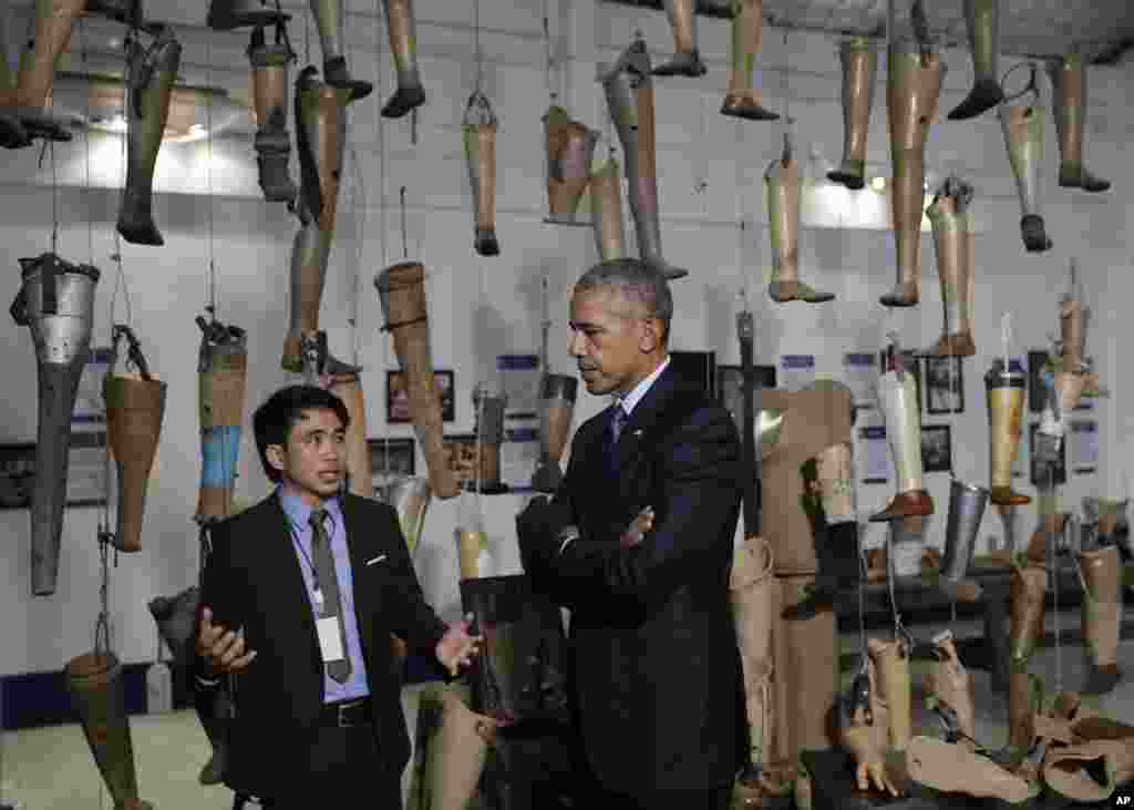 U.S. President Barack Obama tours Cooperative Orthotic and Prosthetic Enterprise (COPE) Visitor Centre in Vientiane, Laos, Sept. 7, 2016.