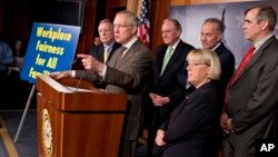 Senate Majority Leader Harry Reid leads a news conference as Democrats gathered after the Senate debate to move toward a historic vote on legislation to outlaw workplace discrimination against gay, bisexual and transgender Americans, on Capitol Hill in Wa