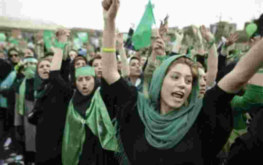 File - A supporter of main challenger and reformist candidate Mir Hossein Mousavi shouts from the crowd amidst a festive atmosphere at an election rally at the Heidarnia stadium in Tehran, Iran, in this June 9, 2009 file photo. A reader-submitted question