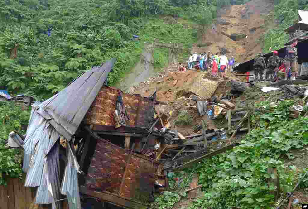 Shanty houses were destroyed after the landslide in Pantukan. (Reuters)