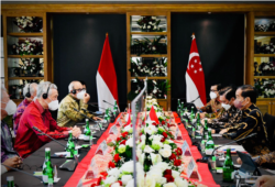 Presiden Joko Widodo dan Perdana Menteri (PM) Singapura, Lee Hsien Loong, menggelar pertemuan bilateral di Ruang Dahlia, The Sanchaya Resort Bintan, Kabupaten Bintan, Kepulauan Riau, Selasa 25 Januari 2022. (Foto: Courtesy/Biro Setpres)