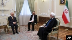  IAEA ကုလသမဂ္ဂအနုမြူအေဂျင်စီ နဲ့ အီရန်သမ္မတ တွေ့ဆုံစဉ်။
