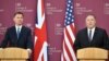 Menlu Inggris Jeremy Hunt (kiri) dalam konferensi pers bersama Menlu AS Mike Pompeo di London hari Rabu (8/5). 