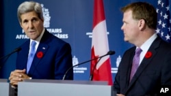 Госсекретарь США Джон Керри с министром иностранных дел Канады Джоном Бэйрдом